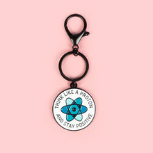 Load image into Gallery viewer, Think Like A Proton Keychain Charm
